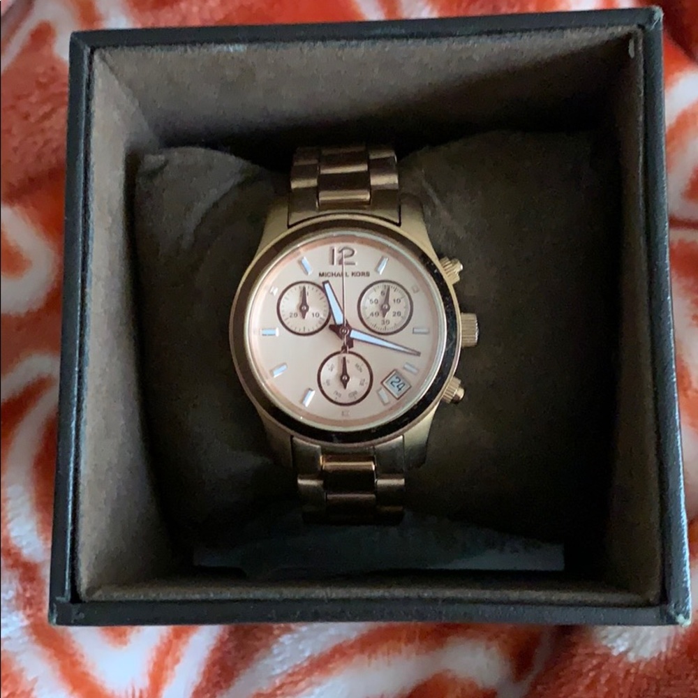 Rose gold Michael Kohrs watch